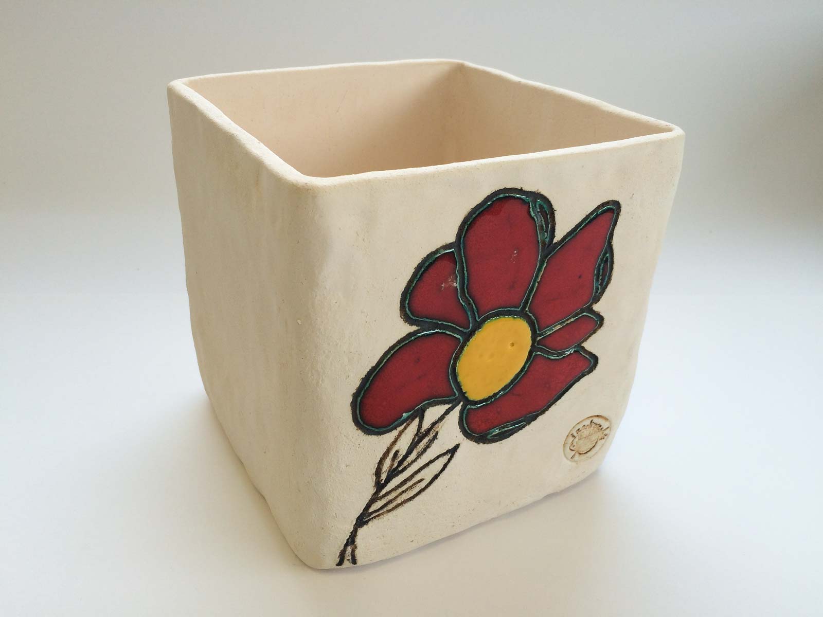 Portavaso fiore in ceramica decorata. Versione rosso